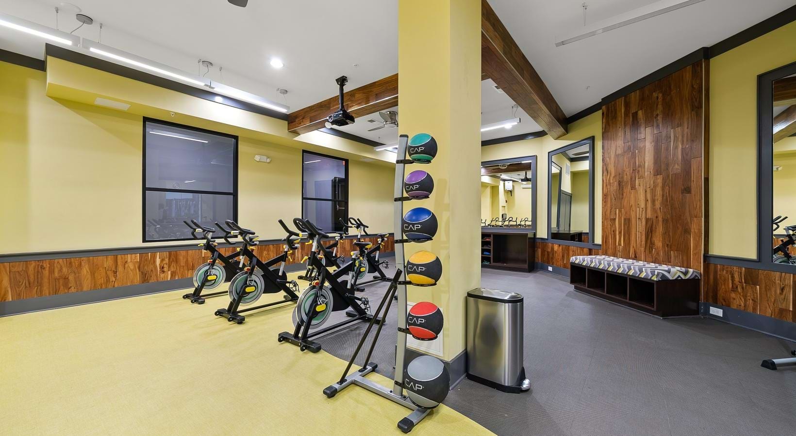Settle into comfort at Jones Grant a gym with exercise equipment