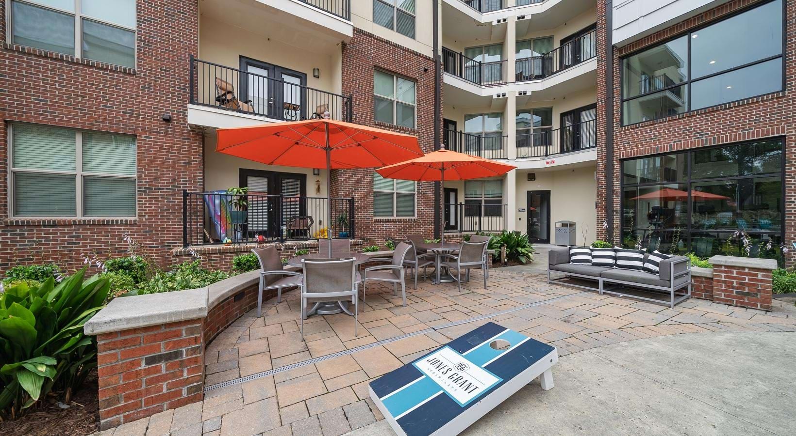 The essence of exceptional living a courtyard with tables and chairs