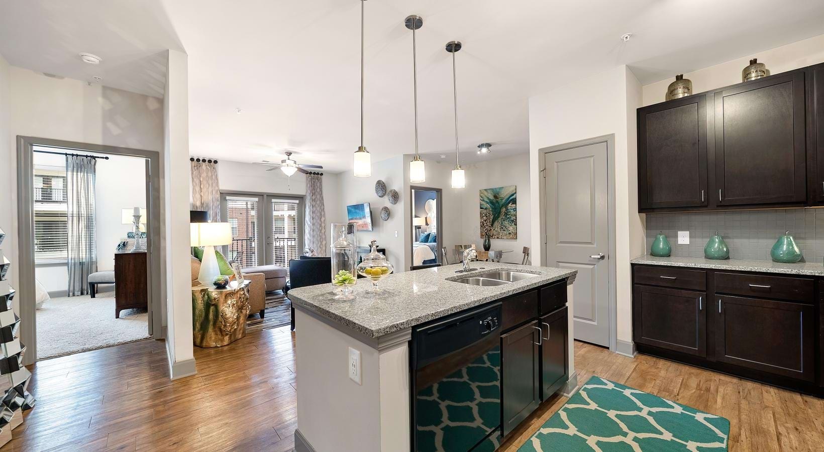 A perfect fit for the whole family a kitchen with a bar and island