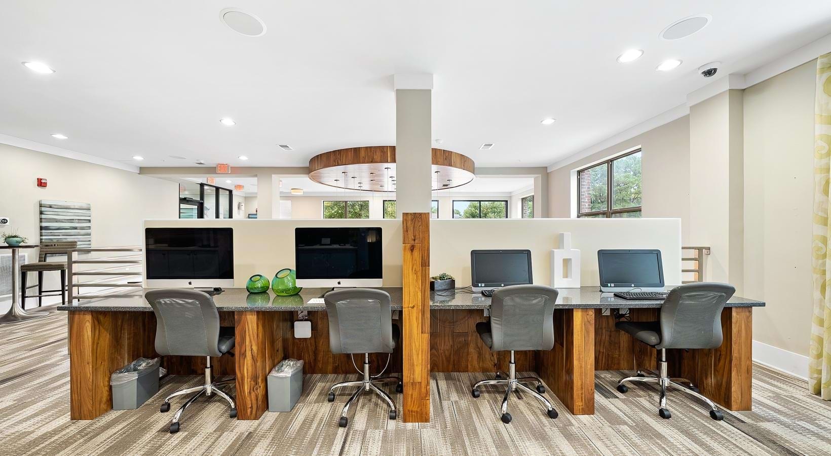 Access to resident-only features a room with a desk and chairs