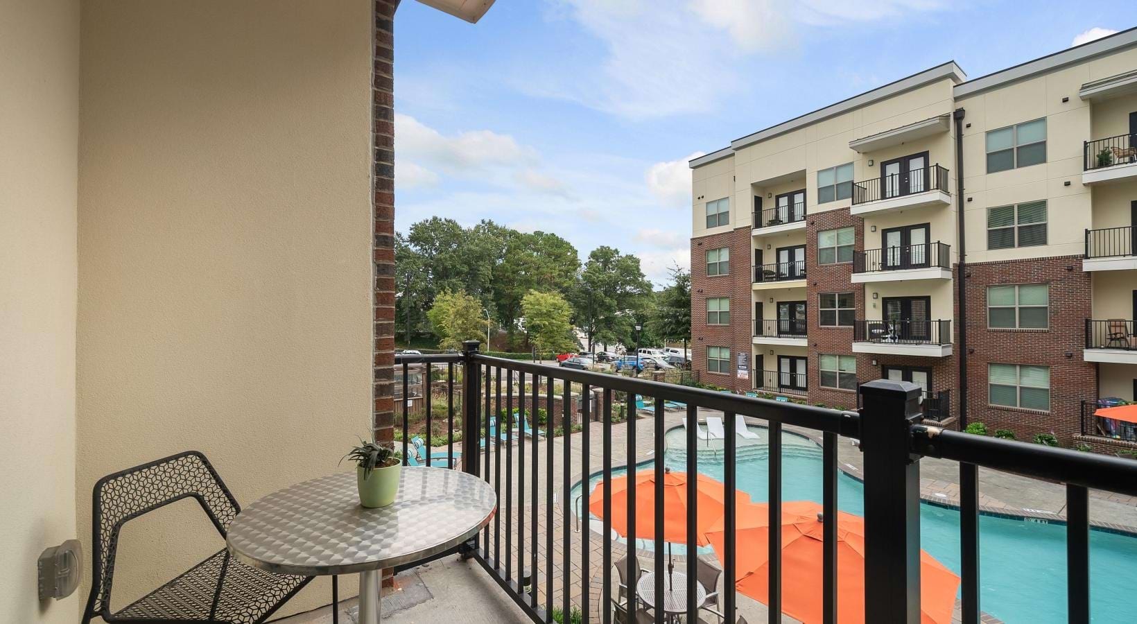 Generous balconies a balcony with a table and chairs