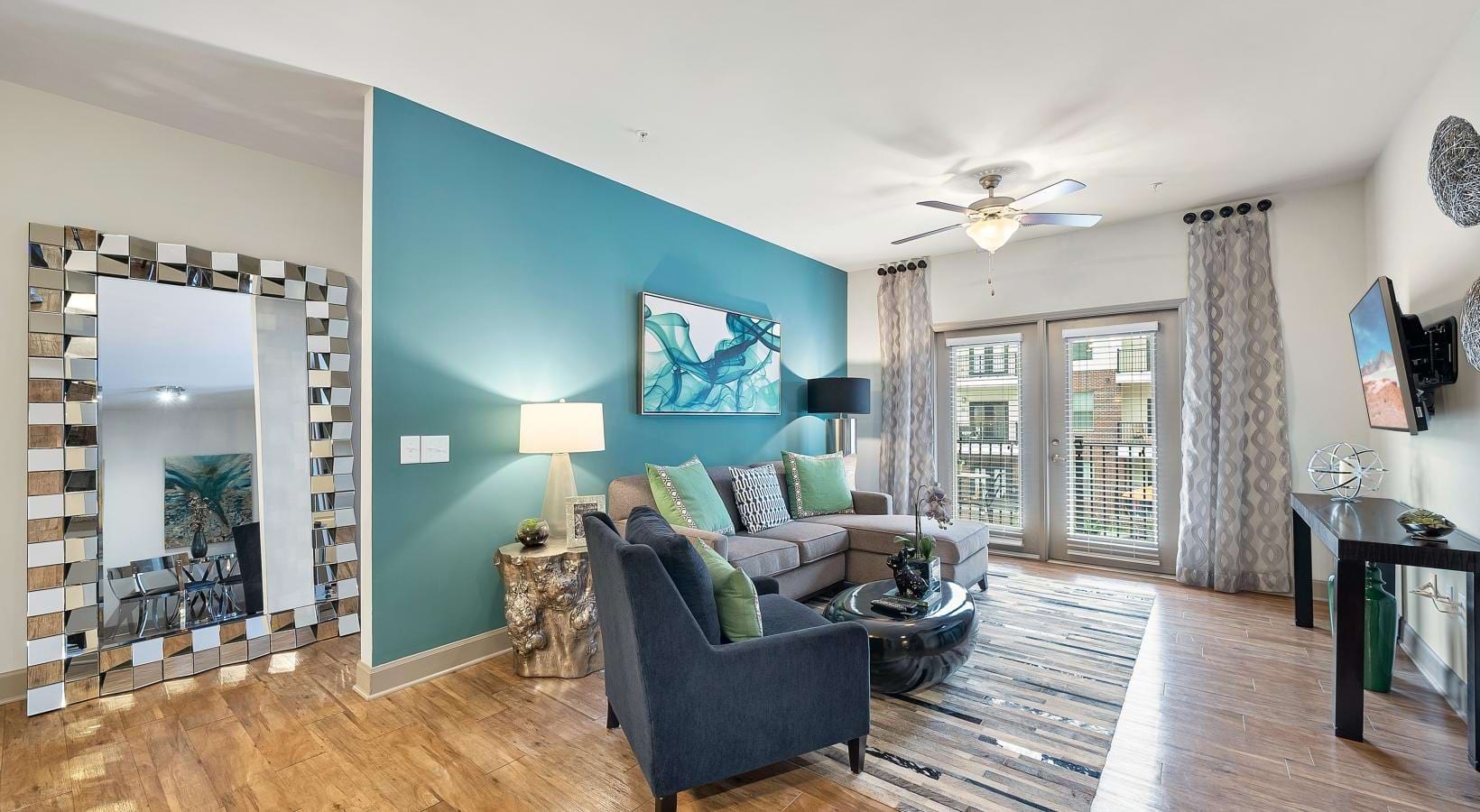 Relax and unwind in stylish living spaces a living room with a blue wall