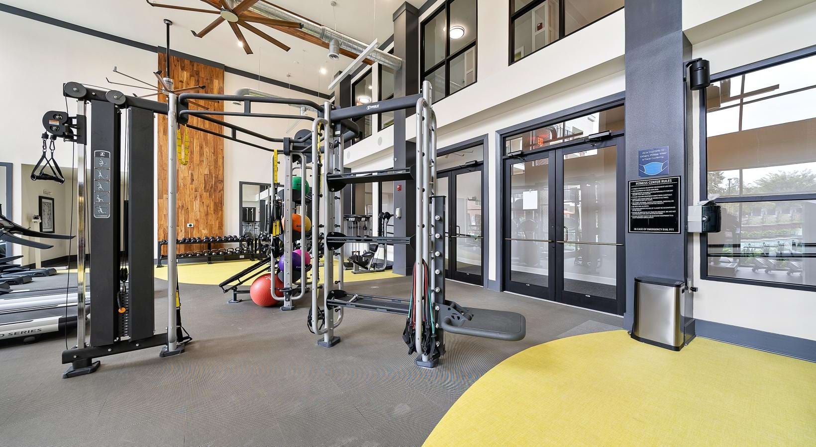 State-of-the-art amenities a gym with exercise equipment